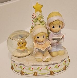 Precious Moments Figurine with Snow Globe